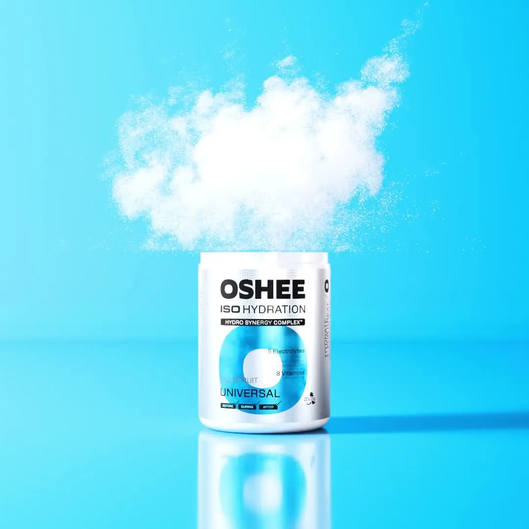 A tub of OSHEE ISO Hydration Universal Multifruit powder on a reflective surface with a billowing cloud of white powder bursting above it, on a blue background, 3D CGI product render